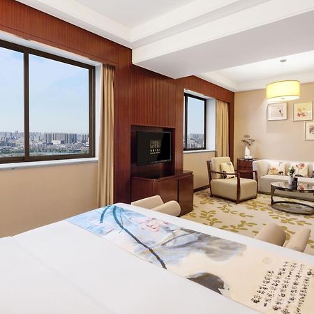 Enlux Hotel Цзинань Экстерьер фото