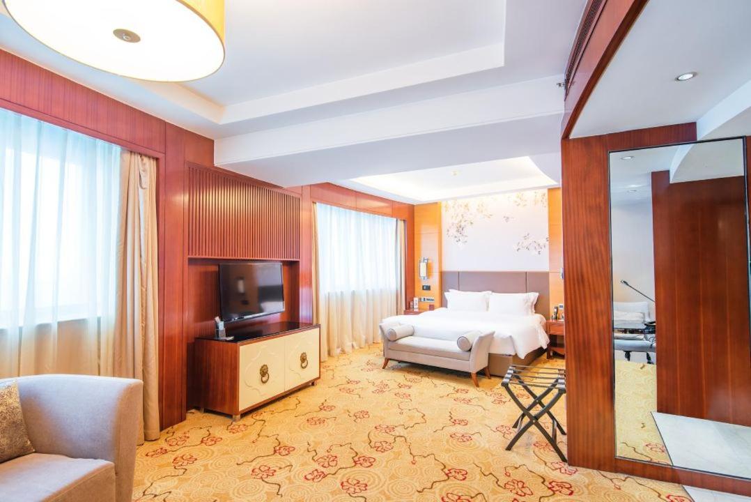 Enlux Hotel Цзинань Экстерьер фото