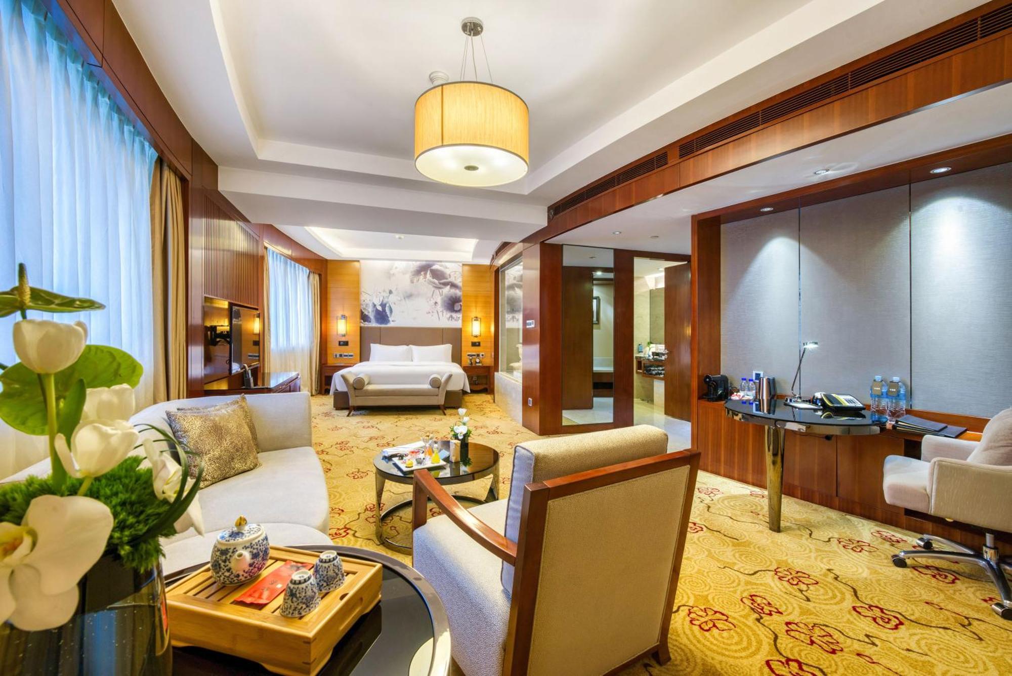 Enlux Hotel Цзинань Экстерьер фото