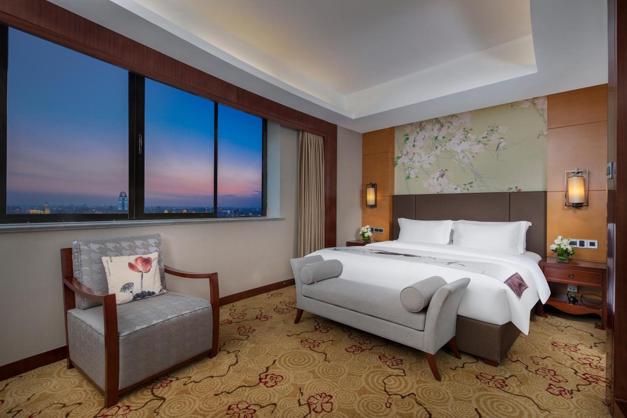 Enlux Hotel Цзинань Экстерьер фото