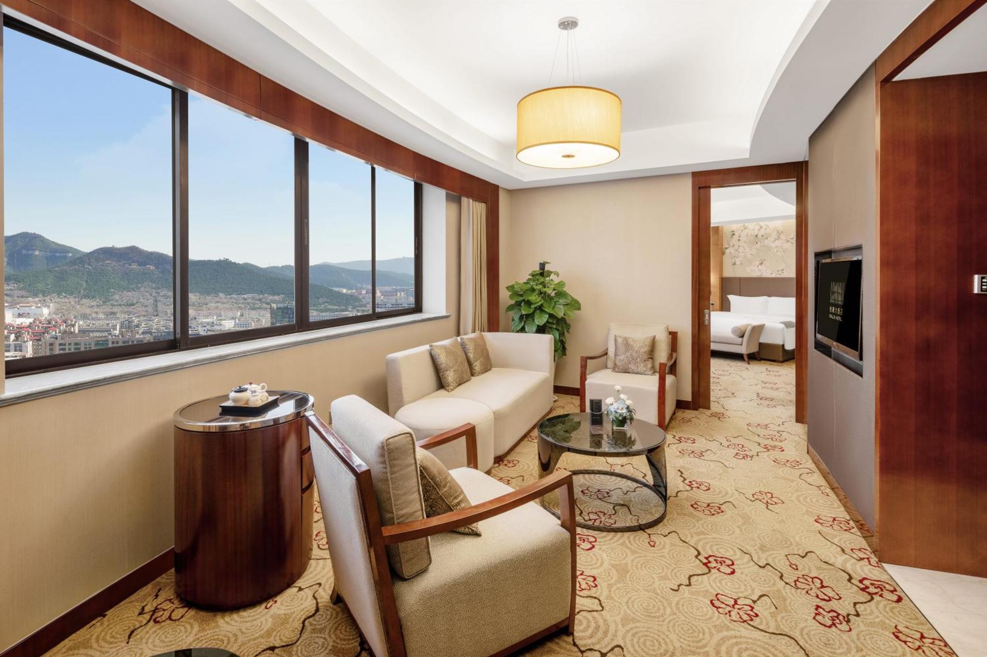 Enlux Hotel Цзинань Экстерьер фото
