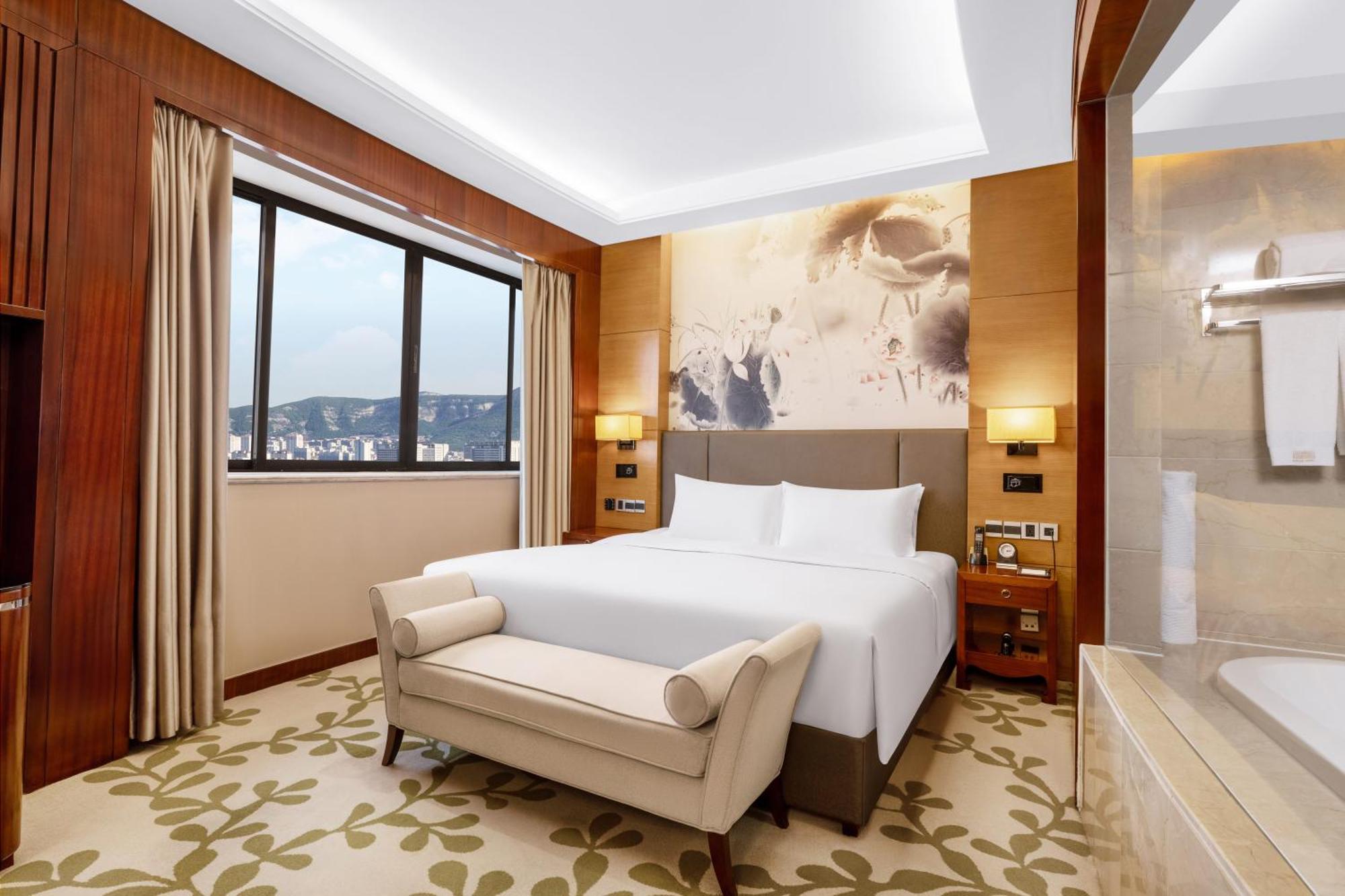 Enlux Hotel Цзинань Экстерьер фото