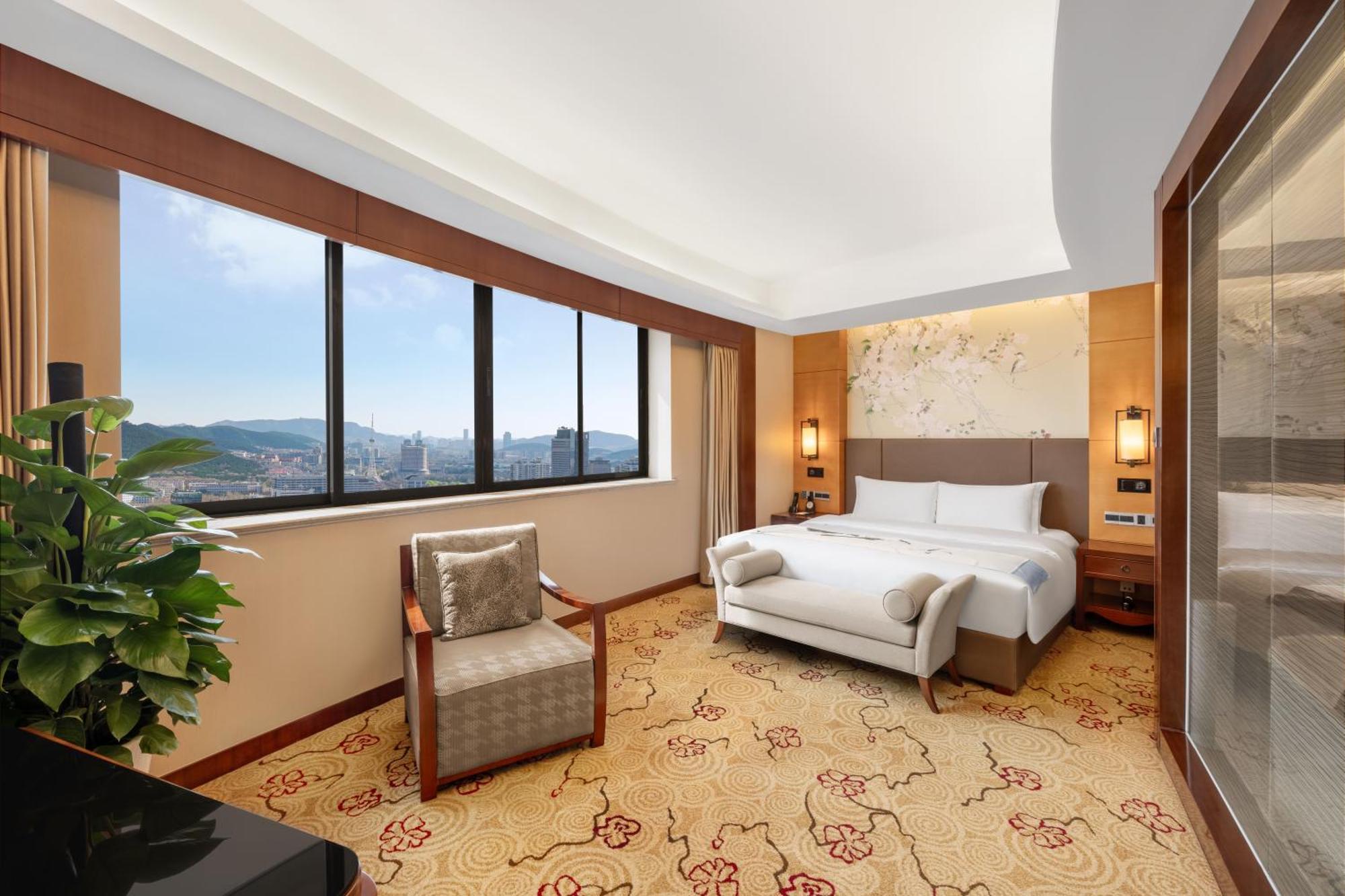 Enlux Hotel Цзинань Экстерьер фото