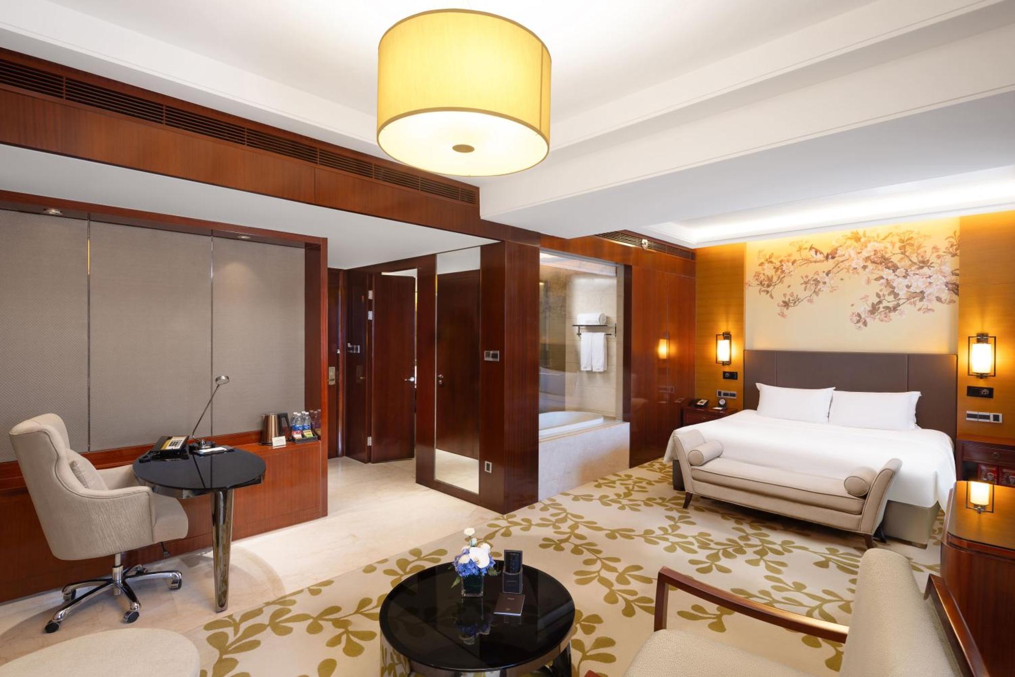 Enlux Hotel Цзинань Экстерьер фото