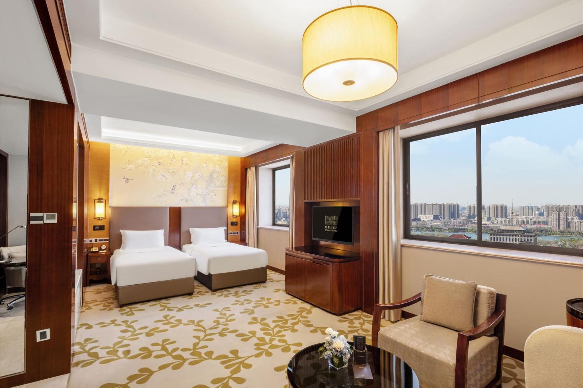 Enlux Hotel Цзинань Экстерьер фото
