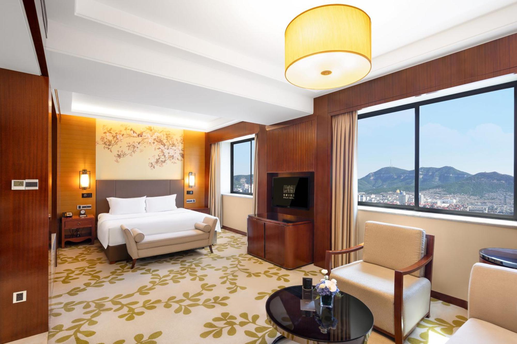 Enlux Hotel Цзинань Экстерьер фото